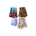 A GROUP OF FOUR DESIGNER SILK SCARVES
