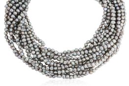A MULTI-STRAND PEARL NECKLACE WITH SILVER HEART PENDANTS