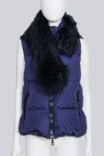 MONCLER - A DOWN PUFFER VEST WITH DETACHABLE ASIATIC RACOON FUR COLLAR