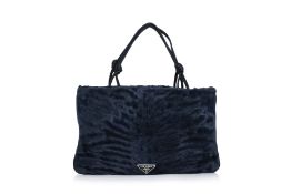PRADA - AN ASTRAKHAN FUR MINI EVENING BAG