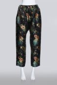 JUNYA WATANABE COMME DES GARCONS - A PAIR OF BLACK CHINOISERIE BROCADE TROUSERS