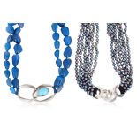 TWO NECKLACES WITH SILVER CLASPS