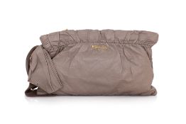 PRADA - A LEATHER BOW CLUTCH