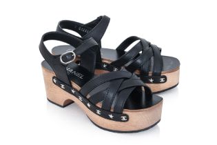 CHANEL - A PAIR OF STUDDED LEATHER WOODEN PLATFORM SANDALS
