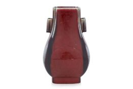 A FLAMBE GLAZED FANG HU FORM PORCELAIN VASE