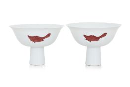 A PAIR OF COPPER RED THREE FISH PORCELAIN STEM BOWLS
