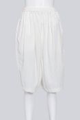 COMME DES GARCONS - A PAIR OF 2015 WHITE BERMUDA SHORTS