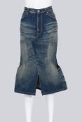 JUNYA WATANABE COMME DES GARCONS DENIM - A 2010 DENIM SKIRT WITH A BLACK KNITTED REVERSE PANEL