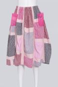 COMME DES GARCONS TRICOT - A 2017 PINK CANVAS CHECKED PATCHWORK SKIRT
