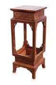 A HARDWOOD JARDINERE STAND