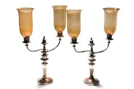 A PAIR OF SILVER PLATED CANDELABRA WITH YELLOW GLASS SHADES