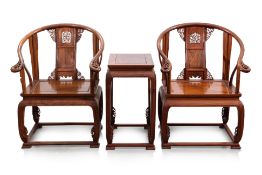 A PAIR OF HORSESHOE BACK CHAIRS AND MATCHING TABLE