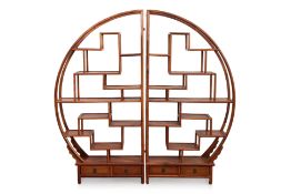 A LARGE WOODEN DISPLAY SHELF