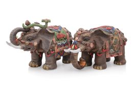 A PAIR OF CERAMIC ELEPHANT FIGURES