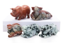 A GROUP OF FIVE STONE CARVED ANIMALS