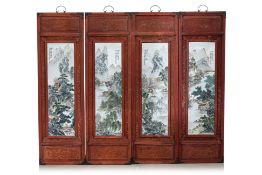 A SET OF FOUR CHINESE PORCELAIN LANDSCAPE PLAQUES