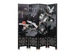 A JAPANESE FOUR PANEL BLACK LACQUERED SCREEN
