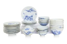 A SET OF EIGHT BLUE AND WHITE PORCELAIN TEA BOWLS, COVERS AND SAUCERS