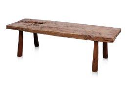 A RUSTIC INDONESIAN WOODEN BENCH