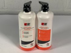A bottle of Revita Stimulating Shampoo Stimulant 925mL and A bottle of Revita conditioner stimulant