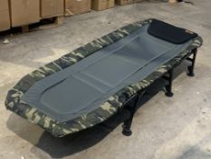 A Prologic Avenger Camo 6 Leg Bedchair. Pre-owned.