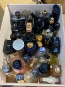 A box of assorted perfumes/toilette to include Christian Dior, YSL, Chanel, Jean Paul Gaultier.