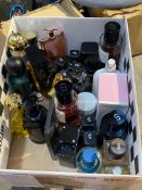A box of assorted perfumes/toilette to include Christian Dior, YSL, Carolina herrera, Victor and wol
