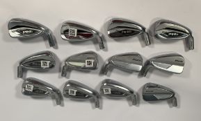 Twelve assorted pre-owned Ping 7 iron clubheads including i525 Black, G425 White and others.