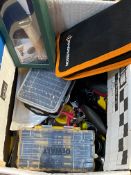 A box of assorted tools to include screwdrivers, drill bits, socket attachments.