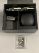 An Oticon Intent 2 Minirite C090 Hearing Aid with Accessories. As New.