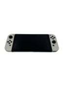 Pre-owned Nintendo Switch OLED Handheld Console (M/N: HEG-001).