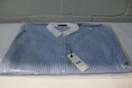 A women's Oui loose fit shirt in blue/white (Size 42).