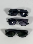 Three pairs of Ray-Ban sunglasses (RB4187, RB2132, RB4605).