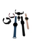 Assorted pre-owned Smartwatches/Fitness Trackers (Untested, sold as seen) and an Apple Watch SE (iCl