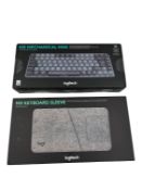 As new Logitech MX Mechanical Mini Wireless Keyboard in Graphite (EAN: 5099206103214) and a Logitech
