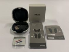 An Oticon Engage BTE Hearing and White Case.