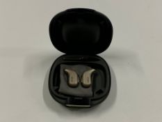 A Pair of Oticon Intent 2 Hearing Aids with case. As new, marks on bottom of case
