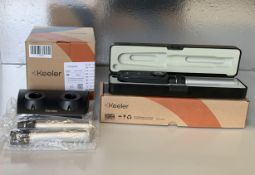 A Keeler 3.6V LED Specialist Ophthalmoscope, REF: 1132-P-1181 and A Keeler Lithium Duo Charger Upgra