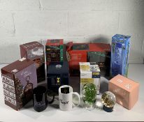 Twelve items to include Snow Globes, Mugs and rela