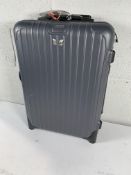 Rimowa Polycarbonate Shell Cabin Wheeled Luggage.
