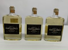 Three Pantalones Anejo Organico Tequila 3 x 750ml (Please Note Damage To Lid Stoppers).