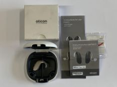 An Oticon Engage BTE Hearing and White Case.