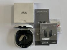 An Oticon Engage BTE Hearing and White Case.