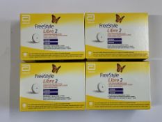 Four FreeStyle Libre 2 Flash Glucose Monitoring Systems (EXP: 2025-12-31). As New.