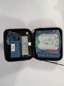 Pre-owned Philips Heartstart HS1 Defibrillator with Carry Case and Battery.