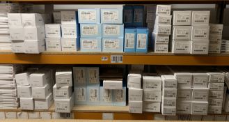 Two shelves of Medtronic Products containing; 90x Minimed Reservoirs (MMT-332A), 36x Guardian 4