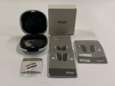 An Oticon Engage BTE Hearing and White Case.