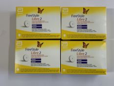 Four FreeStyle Libre 2 Flash Glucose Monitoring Systems (EXP: 2025-12-31). As New.
