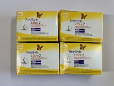 Four as new FreeStyle Libre 2 Flash Glucose Monitoring Systems (EXP: 2026-01-31).
