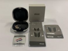 An Oticon Engage BTE Hearing and White Case.